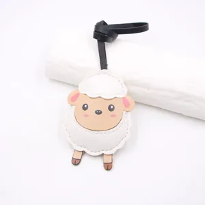 Cute sheep bag charm PU leather pendant fluffy lamb accessory closeup detail view for bags