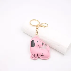 Cute pink leather puppy keychain, padded three-dimensional cartoon bag charm and car key ring.