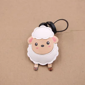 Cute sheep PU leather bag charm keychain pendant detailed view showing stitching clearly.