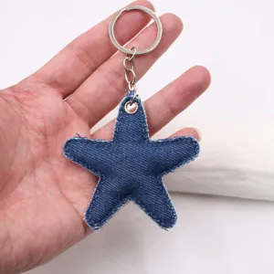 Handgemachter Jeans-Seestern-Schlüsselanhänger mit Baumwollfüllung, ideales Accessoire für Taschen.
