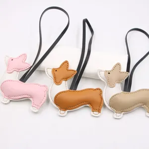 Λεπτομέρεια charm τσάντας από δέρμα corgi, πολυστρωματικό κουτάβι PU με μαύρο κορδόνι.