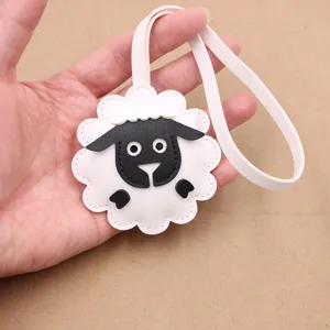 Cute 3D black and white sheep leather bag pendant and luggage tag for daily stylish use.