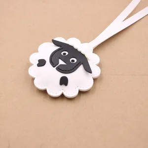 Cute leather sheep bag charm, black and white cute animal keychain pendant for backpacks.