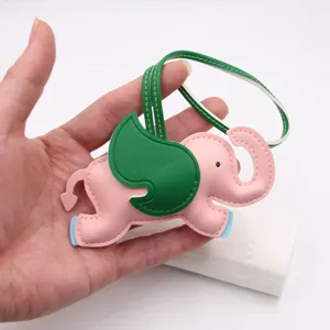 Pink elephant leather bag charm with green wings cute cartoon handbag pendant accessory