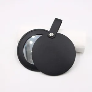 Portable leather pocket makeup mirror with hanging strap and protective case for women bags.