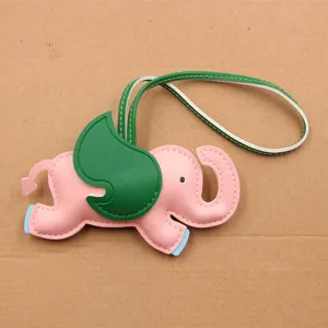 Cartoon Dumbo elephant leather bag charm, color-blocking handbag pendant accessory.