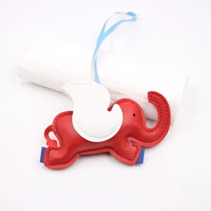 Red and white leather elephant charm detail, cute animal bag pendant for jeans and handbags.