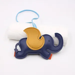 Cute blue elephant leather bag charm with yellow wing hanging pendant daily accessory.