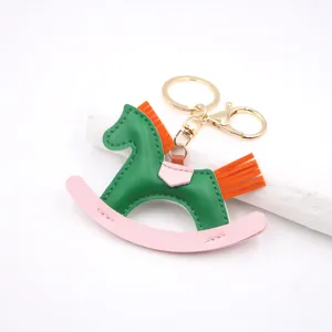 Leather rocking horse keychain bag charm with gold hardware cute colorful design for gifts
