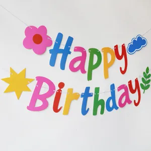 Colorful dopamine birthday paper banner party decoration with cute shapes for wall backdrop setup.
