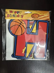 Basketball theme birthday party banner detail shot, decorative hanging letter card setup.