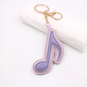 Portachiavi con nota musicale in pelle con motivo litchi addensato accessori borsa auto