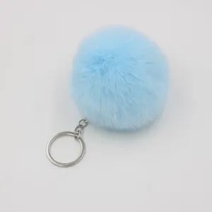 Light blue faux rabbit fur pom pom keychain, cute fluffy bag charm and key ring pendant.