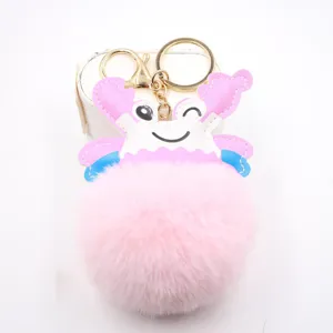 Cute pink crab plush pom-pom keychain, soft bag charm and car key accessory detail shot.