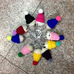 Cute knitted mini hat keychain fur pom pom bag charm cute accessories for women.