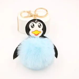 Simpatico portachiavi pinguino in peluche blu pon pon soffice ciondolo borsa auto