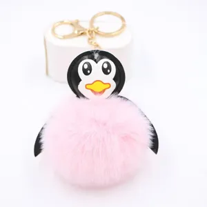 Simpatico portachiavi con pompon di peluche pinguino per donna, morbida borsa charm.