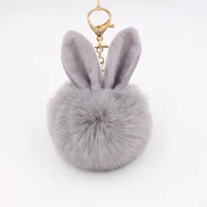 Fluffy bunny ear keychain, faux fur pom pom bag charm, cute plush key ring for women and girls.