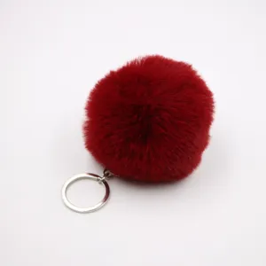 Fluffy faux rabbit fur pom pom keychain, soft red bag charm and cute car key ring pendant.