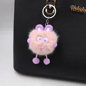 Cute fluffy bunny plush keychain pendant with big eyes for bags and keys ornament accessory.