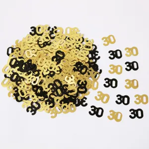 Goldene und schwarze Nummer 30 Konfetti Stücke für Geburtstag Party Tischdeko und Festlichkeiten.