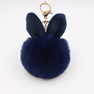 Cute rabbit ear plush pompom keychain, dark blue fluffy faux fur bag charm and pendant.