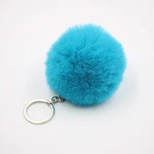 Faux rabbit fur pom pom keychain, soft fluffy bag charm and cute car hanging accessory.