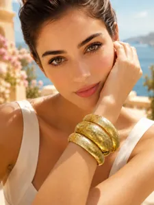Gold-plated stainless steel cuff bracelets featuring delicate vintage matte embossed patterns.
