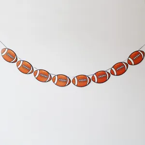 Football party banner decoration paper garland for sports themed birthday party celebration.