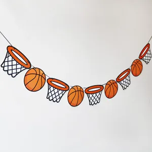 Close-up detail of basketball theme paper garland banner for sports birthday party decor.