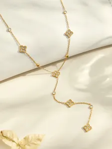 Close-up detail of the elegant gold-plated four-petal flower zircon Y-shaped necklace pendant.