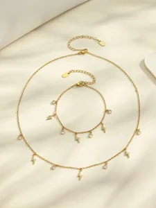 Gold-tone zircon lightning charm necklace bracelet set, elegant fashion jewelry for women.