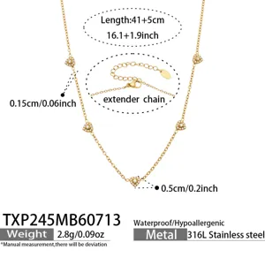 Gold-plated stainless steel multi-heart pendant necklace with extender chain and sparkling zircon.