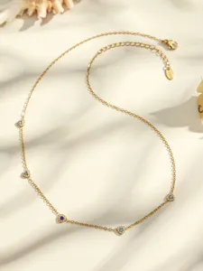 Gold-plated titanium steel necklace with multi-color heart cubic zirconia stations for women.