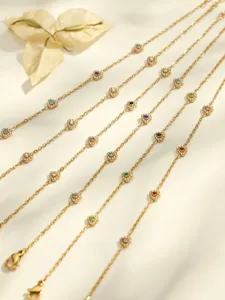 Gold plated stainless steel multi-color heart zirconia station necklace bracelet set detail view