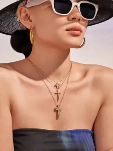 Multi-layer cross pendant necklace featuring sparkling zirconia for chic modern women.