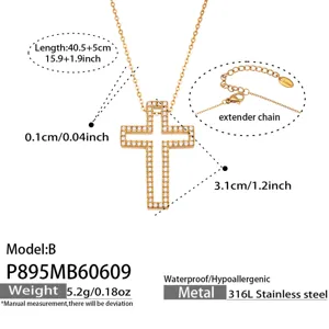 Detailed view of the gold-tone cross pendant necklace featuring sparkling zirconia stones.