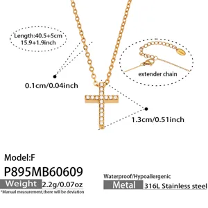 Gold stainless steel cross pendant necklace detail view showing size and zircon stones.