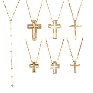 Chic gold cross pendant necklaces set featuring dazzling cubic zirconia and delicate chains.