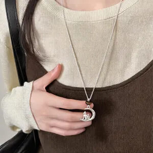 Silver crescent moon cat necklace with tiger eye bead, elegant sweater chain for women.