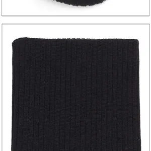 Black knitted winter neck warmer detail shot, soft thermal textured fabric for cold weather.