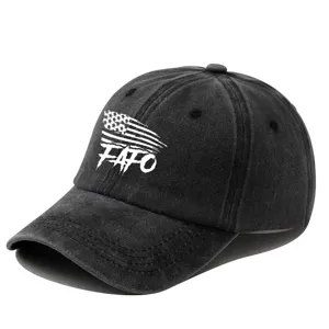 Detailed shot of vintage washed cotton baseball cap with distressed front graphic text.