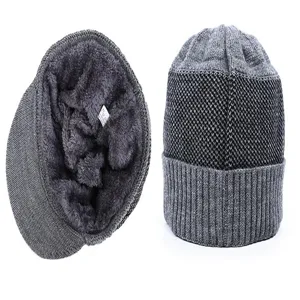 Bonnet tricoté d'hiver gris doublé de polaire vue détaillée montrant la doublure chaude.