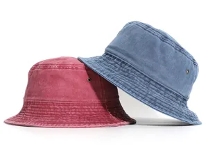 Detailed view of casual washed cotton bucket hat, solid color design with metal eyelets.
