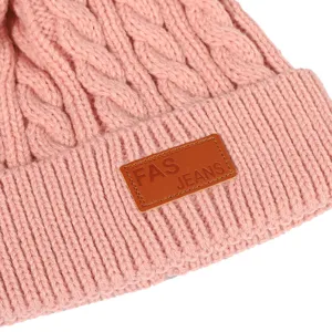 Pink knit beanie winter warm children hat with leather label and cable pattern for kids