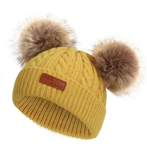 Children winter knit beanie hat with double faux fur pom poms cute warm cap yellow detail