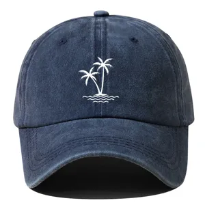 Washed cotton baseball cap with stylish white palm tree print, classic curved brim detail.