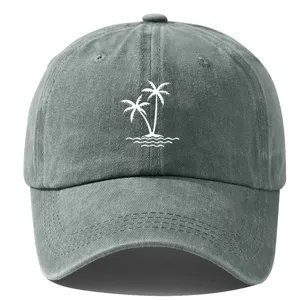 Detail shot of vintage washed grey baseball hat featuring a white palm tree graphic design.