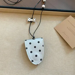 Gepunktete Brillenhalter Halskette, stilvoller Sonnenbrillen-Clip mit Schleife und Perle.