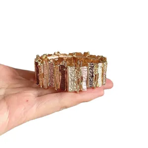 Vintage Elastik-Armband mit klobigen, strukturierten Metallsegmenten in vielen Farben Damen.